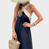 Elegantna haljina s otvorenim leđima i modernim preklopljenim okom