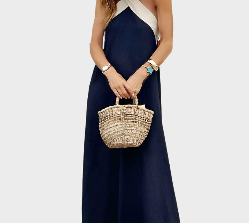 Elegantna haljina s otvorenim leđima i modernim preklopljenim okom