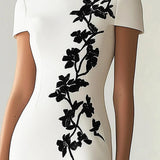 Audrey | Chic cvjetni print midi haljina