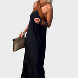 Elegantna haljina s otvorenim leđima i modernim preklopljenim okom