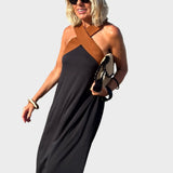 Elegantna haljina s otvorenim leđima i modernim preklopljenim okom