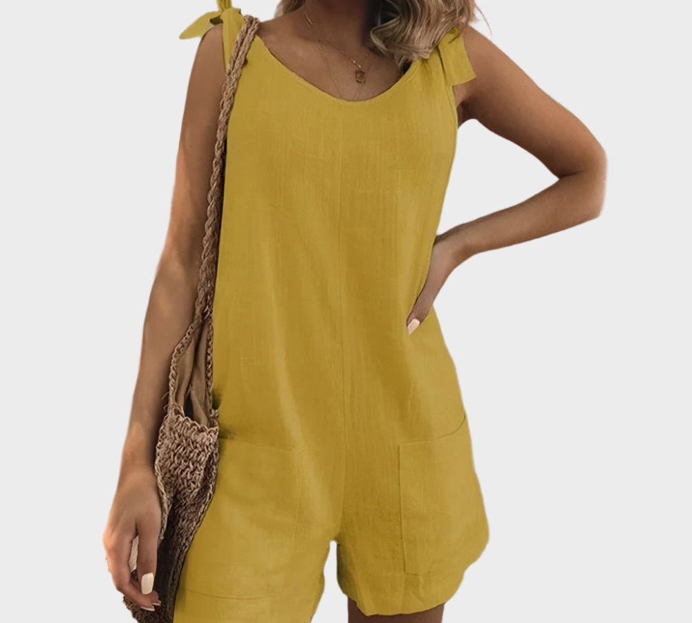 Potpuni kombinezon s kaiševima, mašnom i džepovima