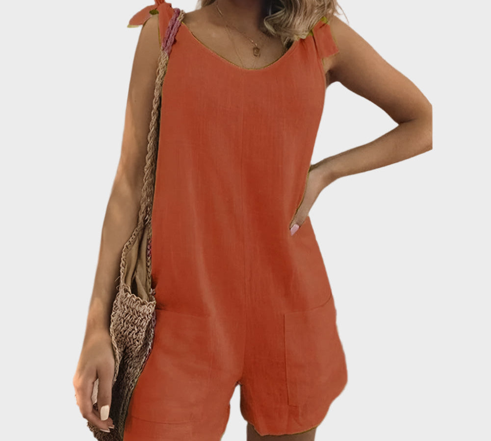 Potpuni kombinezon s kaiševima, mašnom i džepovima