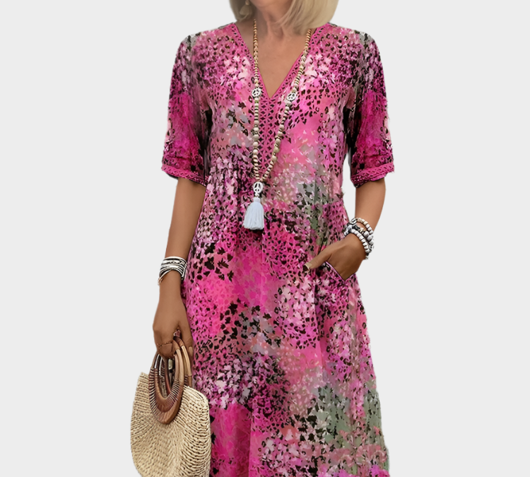 Prozračno laneno haljina s ljetnim uzorkom i V-izrezom